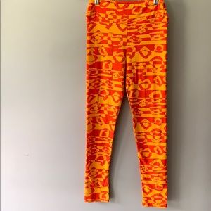 lLuLaRoe leggings OS orange yellow fangs NWOT